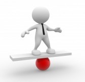 Man on balancing board